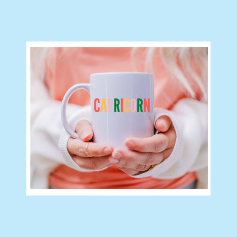 Capricorn 11 ounce multi-color text mug